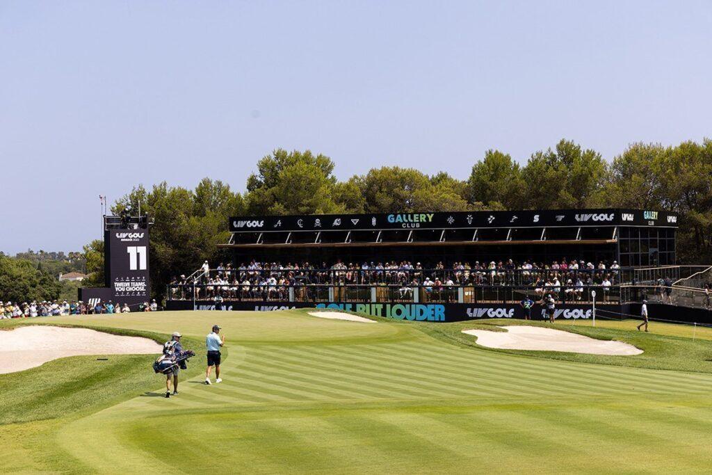 Golfer putting on a lush green course near Valderrama in Sotogrande